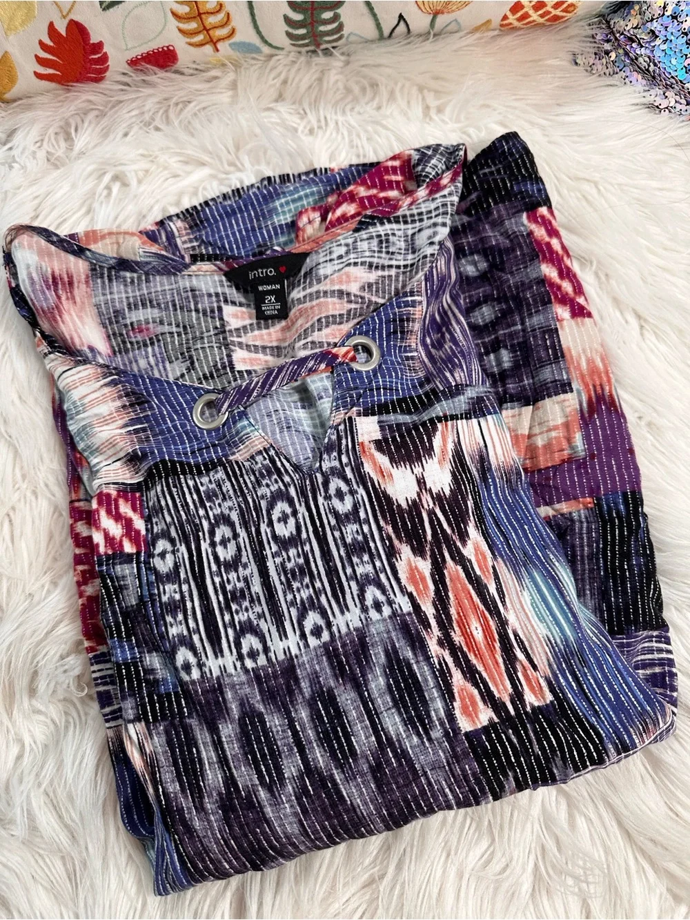 Intro • Ikat Design Ruffle Sleeve Metal Grommet Blouse